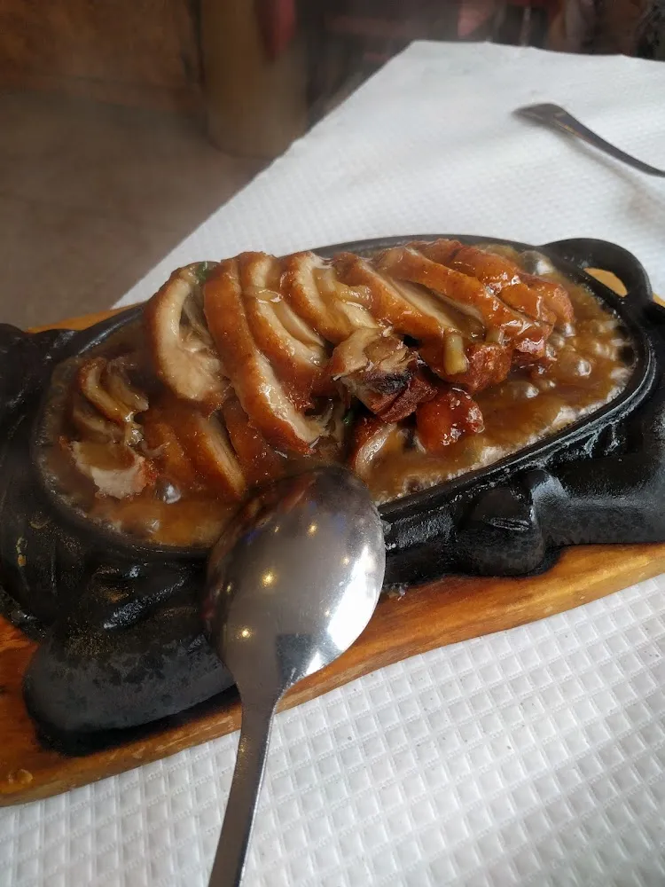 Canard Laqué Sur Plaque Chauffante